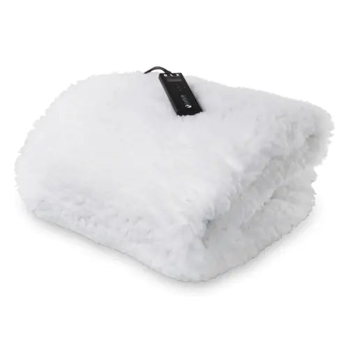 Plush fleece Earthlite DLX digital table heating pad on a spa massage bed.