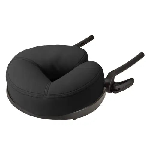 Adjustable massage table face cradle platform with plush crescent face pillow.