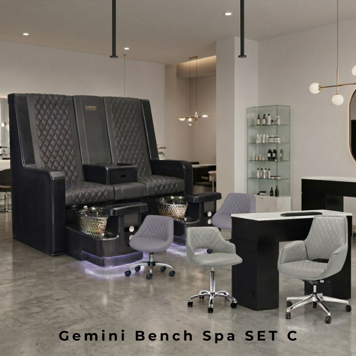 Gemini Bench Spa SET C salon furniture set featuring a black leather double pedicure bench with foot baths and a matching manicure desk with grey rolling chairs.